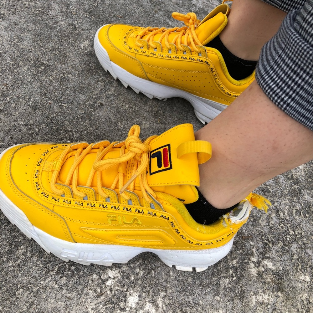 Yellow Fila Disruptors